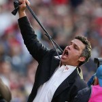 Fos's son Mark Williams mimics the choke his critics wrongly predict for his destiny as coach. The hangman's noose now part of the "enviable tradition"